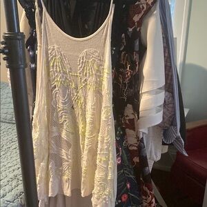 Free People White Tank Top with Elegant Design